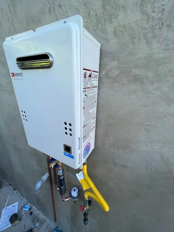 Tankless water heater installation for Wyldwood homes